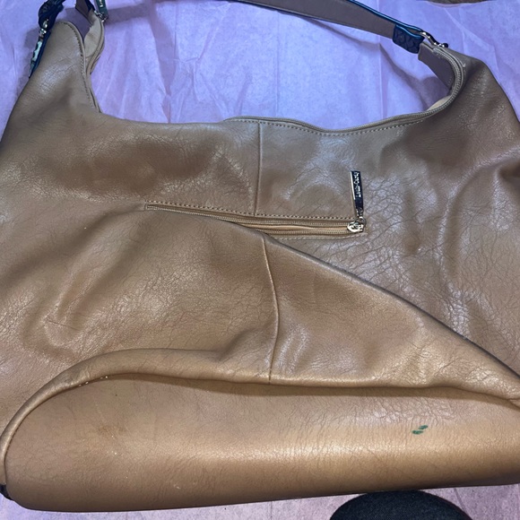 This is a brown-tan Louis Candy purse in healthy condition - Picture 5 of 5